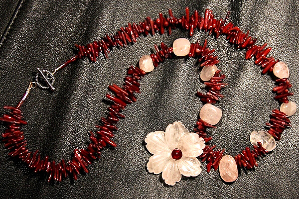 Rose Quartz Flower among Burgundy Coral Thorns